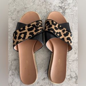 Kate Spade leather and pony hair sandals.  They are in fabulous condition.